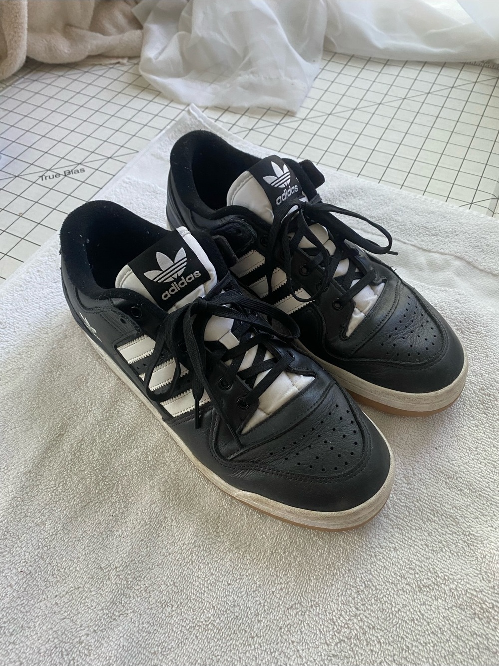 adidas Black and White Low-Top Sneakers with Three Stripes